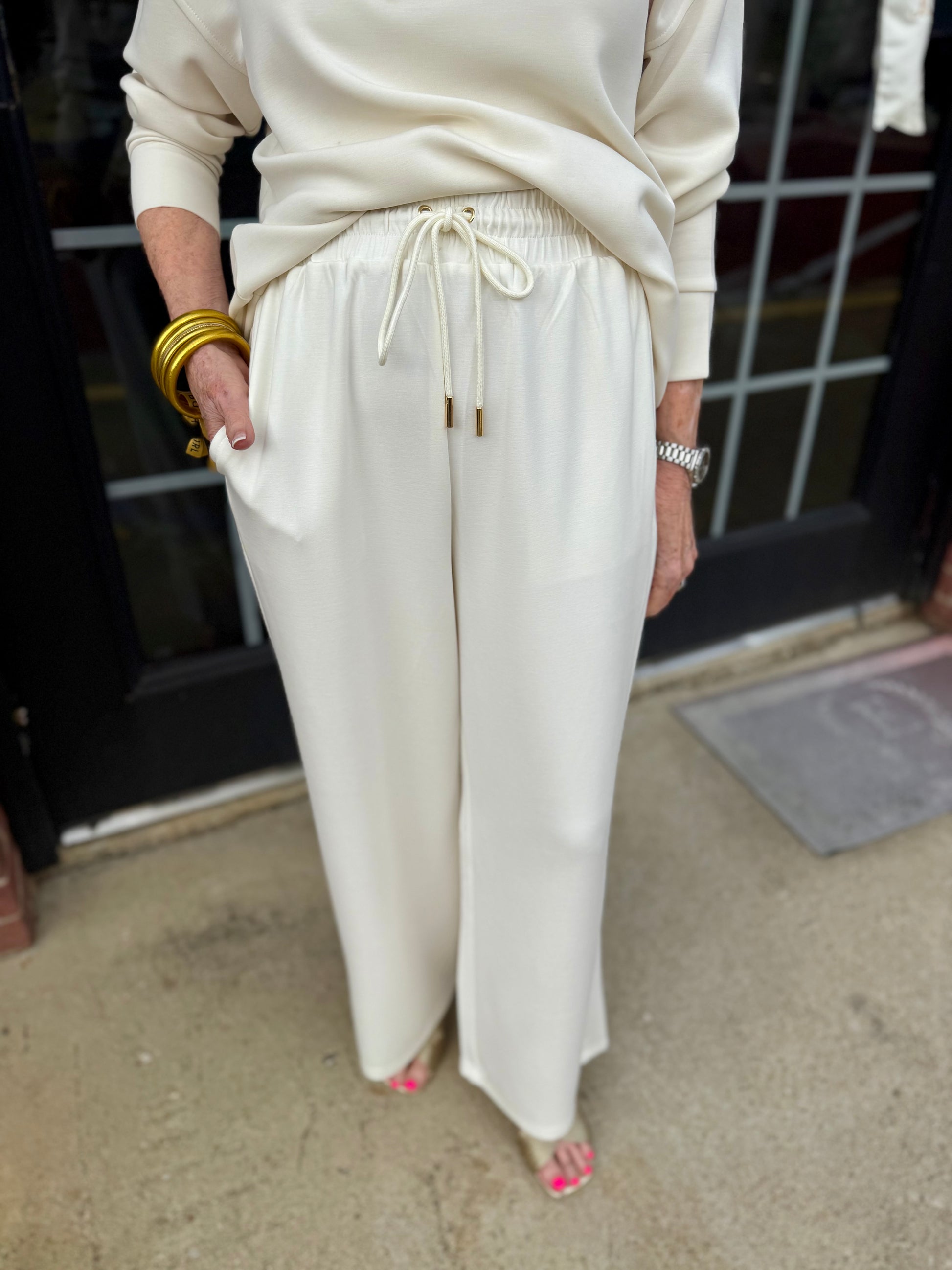 Hazel Ivory Pants in cream, available in sizes XS–XL.