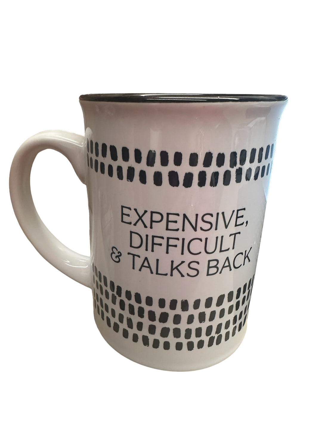 The Expensive, Difficult &amp; Talks Back Mug is a large white coffee mug with a handle, featuring a dotted black pattern around the upper and lower parts. Text in the middle reads "EXPENSIVE, DIFFICULT &amp; TALKS BACK." It has a black inside rim. Available Size: Large.