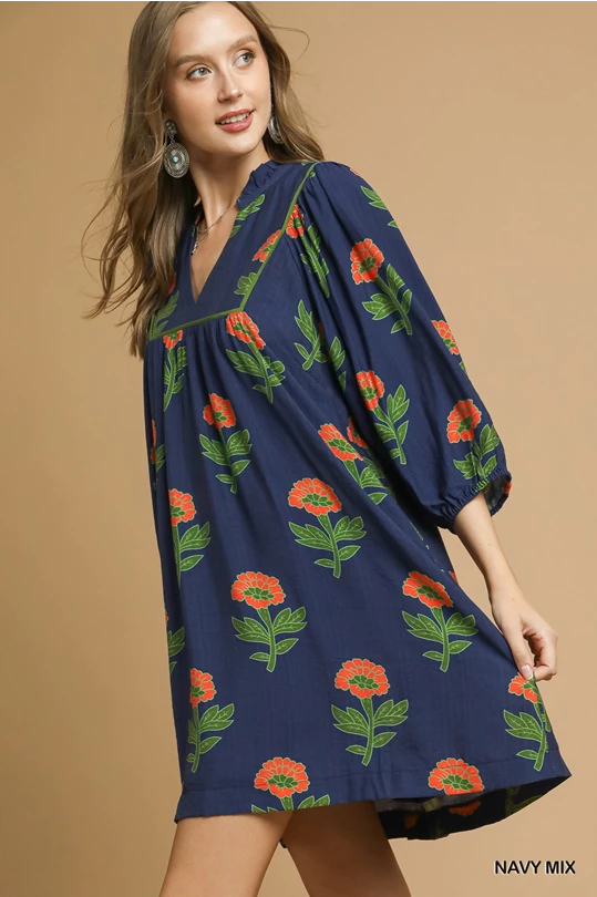 Kelly Navy Mix Dress: loose-fitting mini, floral print, three-quarter balloon sleeves, v-neck. Sizes: XS-XL.