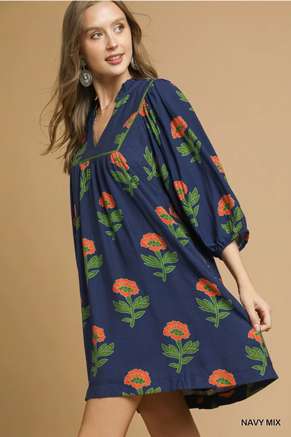 Kelly Navy Mix Dress: loose-fitting mini, floral print, three-quarter balloon sleeves, v-neck. Sizes: XS-XL.