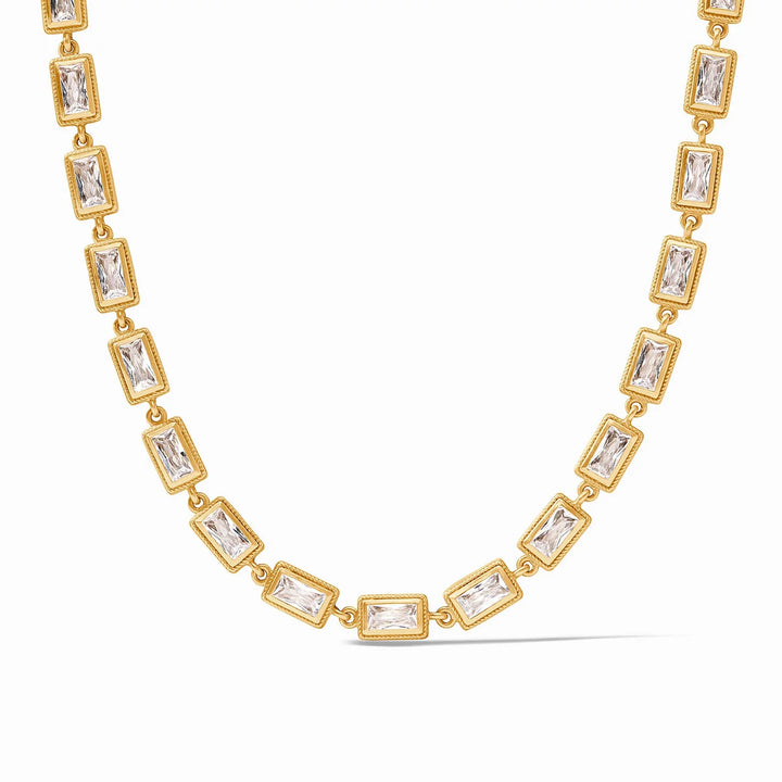 Baguette Tennis Necklace: 24K gold plated with evenly spaced baguette-cut gemstones. Available in multiple sizes.