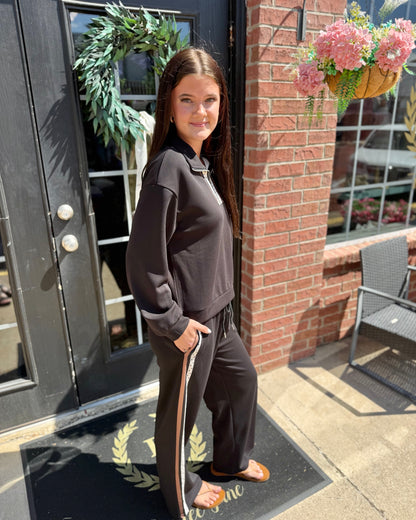 Margot Polka Dot Striped Pants: black with tan stripes and polka dots, available in sizes XS–XL.