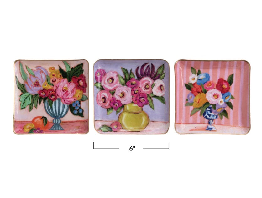 Set of three square enamel floral trays with hand-painted vase and flower designs; each tray measures 6 inches.