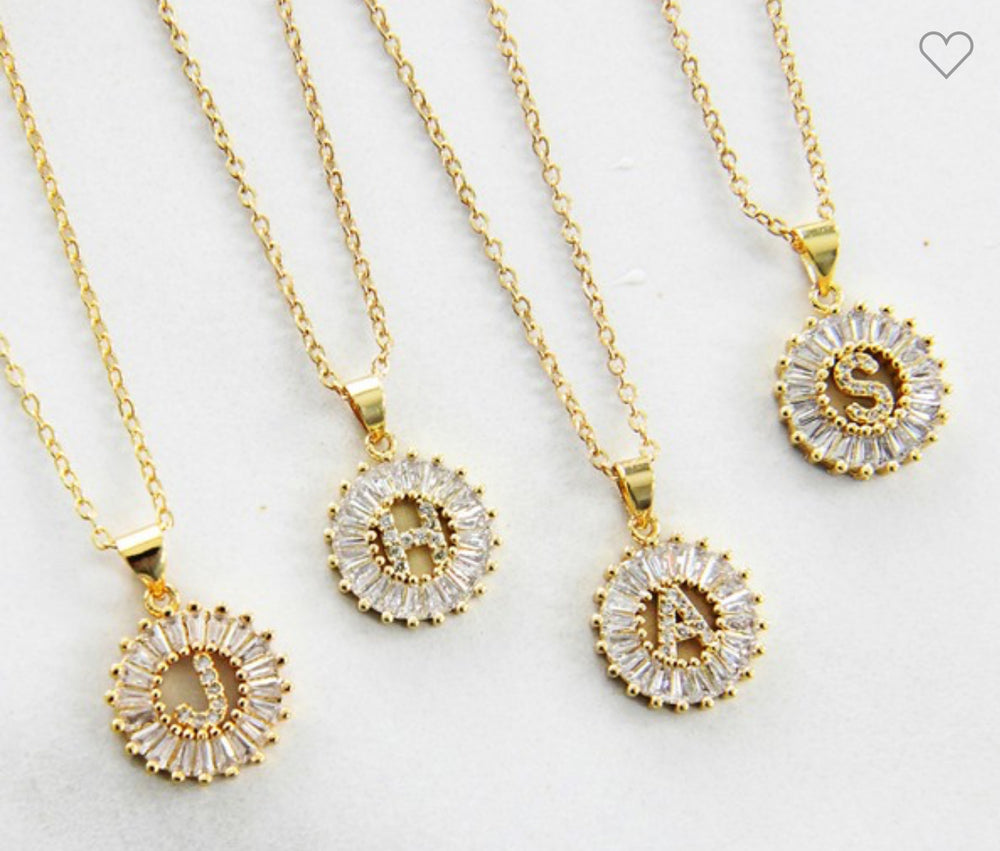 Stainless steel necklaces with CZ initial pendants (D, B, A, S). Available in 16", 18", and 20" lengths.