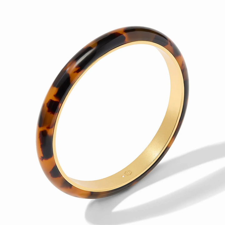 Madison Statement Bangle by Julie Vos: round tortoiseshell, glossy pattern, 24K gold-plated inner lining. Available in S/M/L.