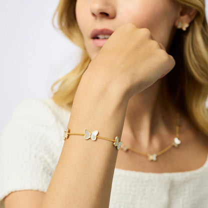 Papillon Delicate Bracelet-Mother of Pearl: 24K gold plated butterfly charm. Available in S, M, L sizes.