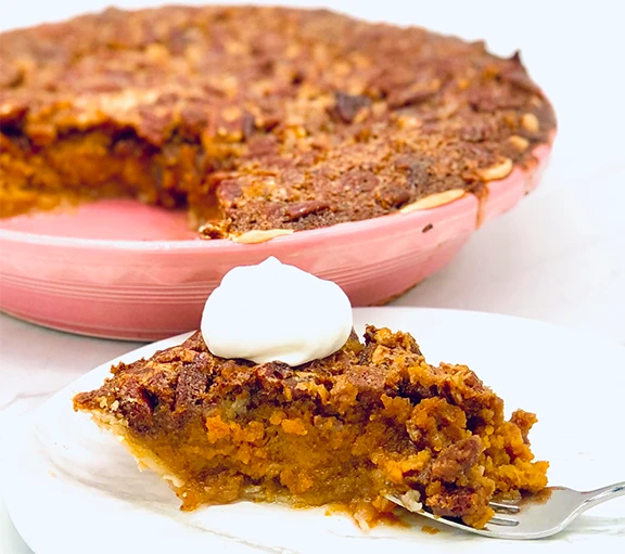 A slice of dessert made with Carmie’s Pumpkin Spice Cheesecake Dip Mix, topped with whipped cream and pumpkin cinnamon notes. Available in 8 oz and 16 oz sizes.