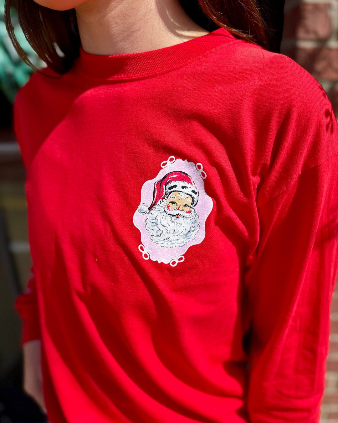 Bright red Jolly Santa Scalloped Long Sleeve tee with vintage-style Santa Claus graphic, available in sizes XS-XXL.