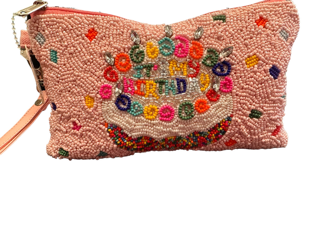 Pink 7x4.5" wristlet with beaded birthday cake, multicolored accents, left wrist strap. Only size: 7x4.5".