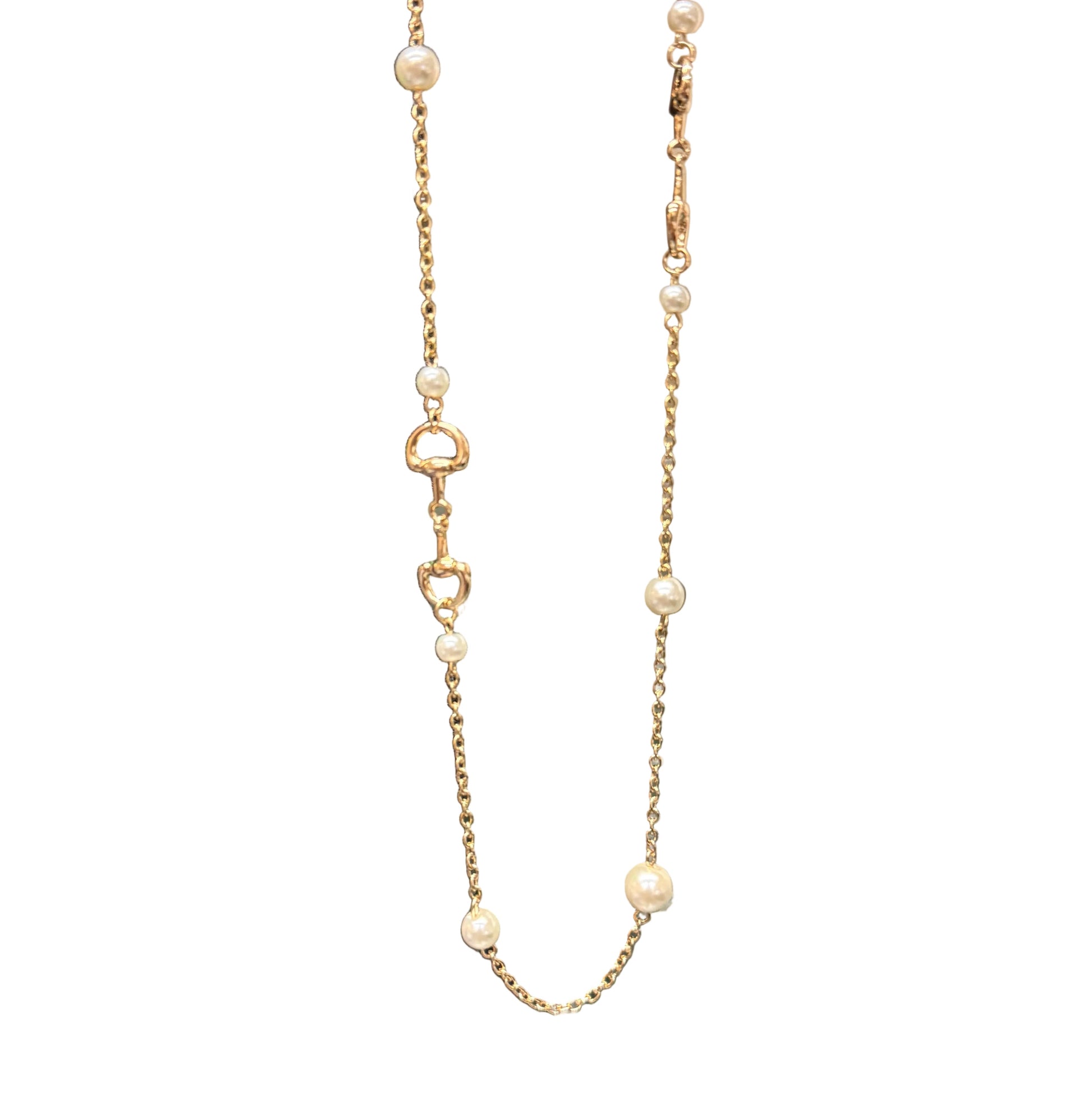 Candy Gold Pearl Necklace with small pearls, gold heart-shaped links, and horse-bit details along the chain. Available in 16" and 18" lengths.