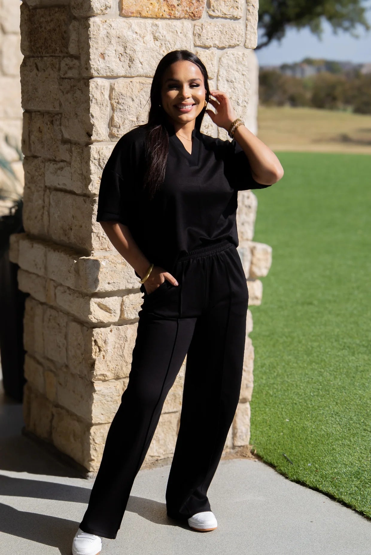 Black Butter Soft Pants with a wide-leg silhouette; available in sizes XS-XL.