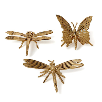 Set of three gold-toned metal insects, including two dragonflies and one butterfly, with intricately textured wings and bodies. Available in small, medium, and large sizes.