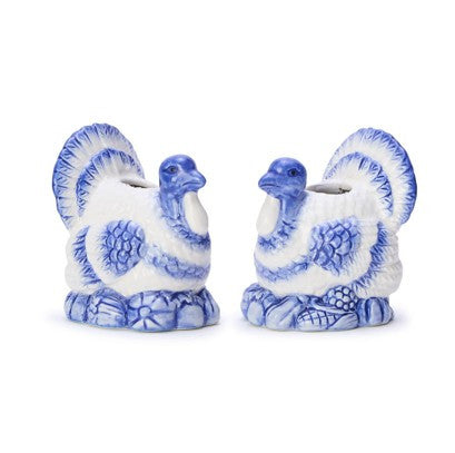 Blue and white hand-painted turkey candleholders, available in small and large sizes.