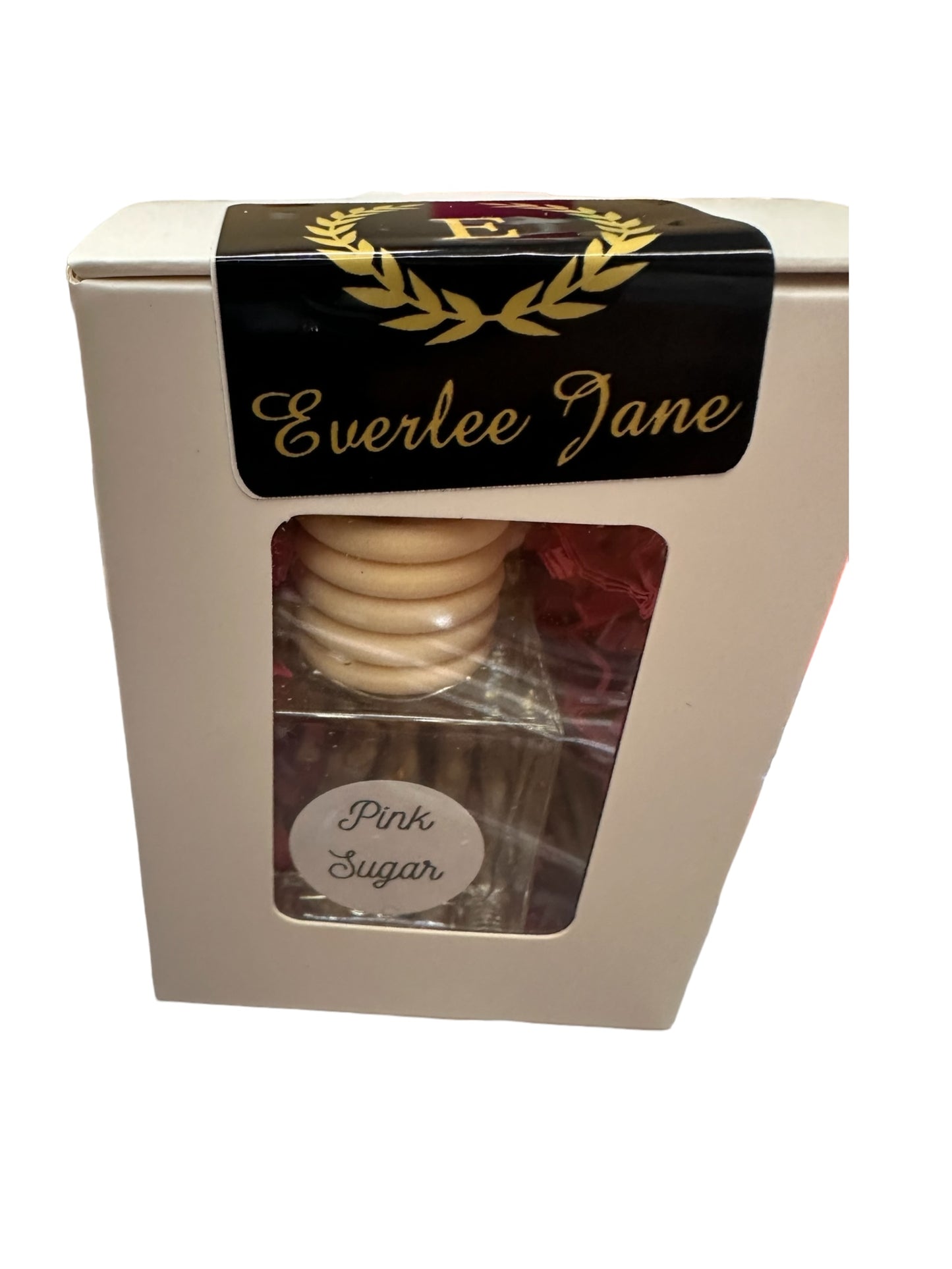 Wooden honey dipper in a white box with a clear front window. Top label: "Everlee Jane" with gold laurel wreath. Inside label: "Pink Sugar," for refreshing car scents.

Sizes available: N/A