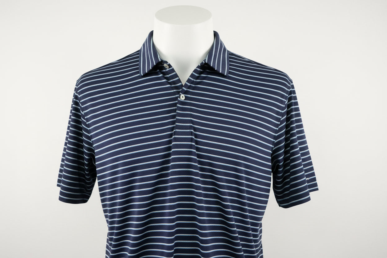 Navy blue men’s polo with white horizontal stripes and short sleeves. Available in sizes S, M, L, XL.