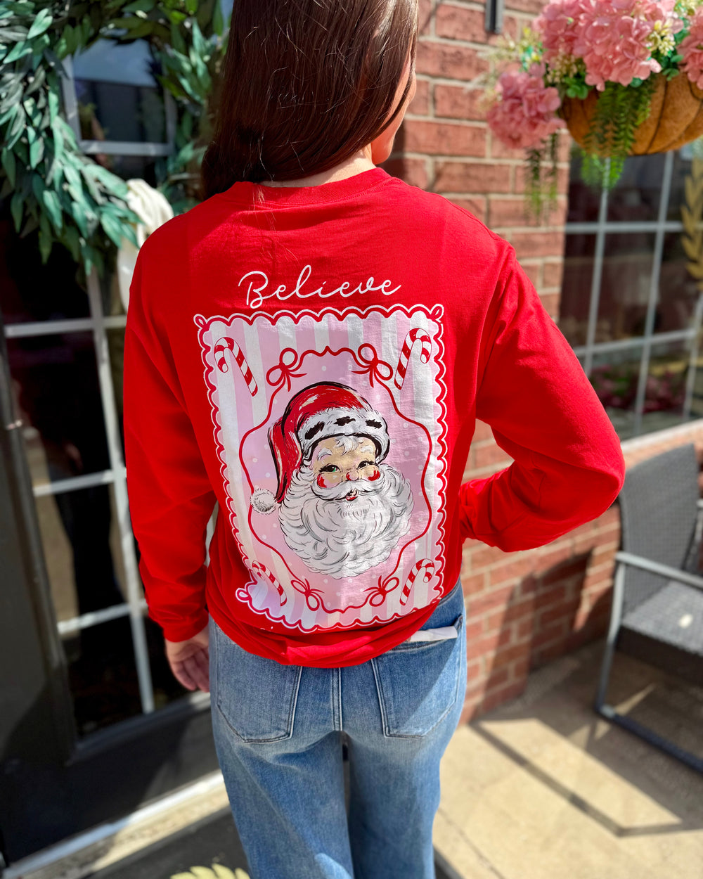 Jolly Santa Scalloped Long Sleeve featuring a festive Santa Claus design on the back; available in sizes S-XXL.