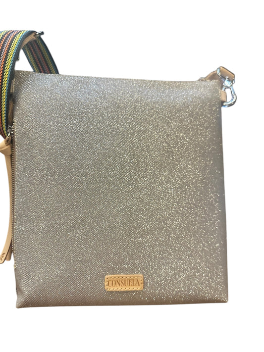 Square silver glitter crossbody bag with textured surface, tan Consuela logo patch, striped shoulder strap. Sizes: S, M, L.