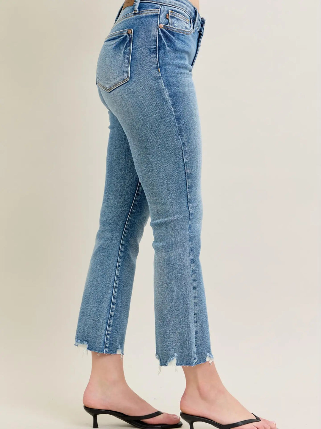 Judy Blue MR Kick Flare Destroy Hem Vintage Wash Jeans shown; available in sizes 0-20.