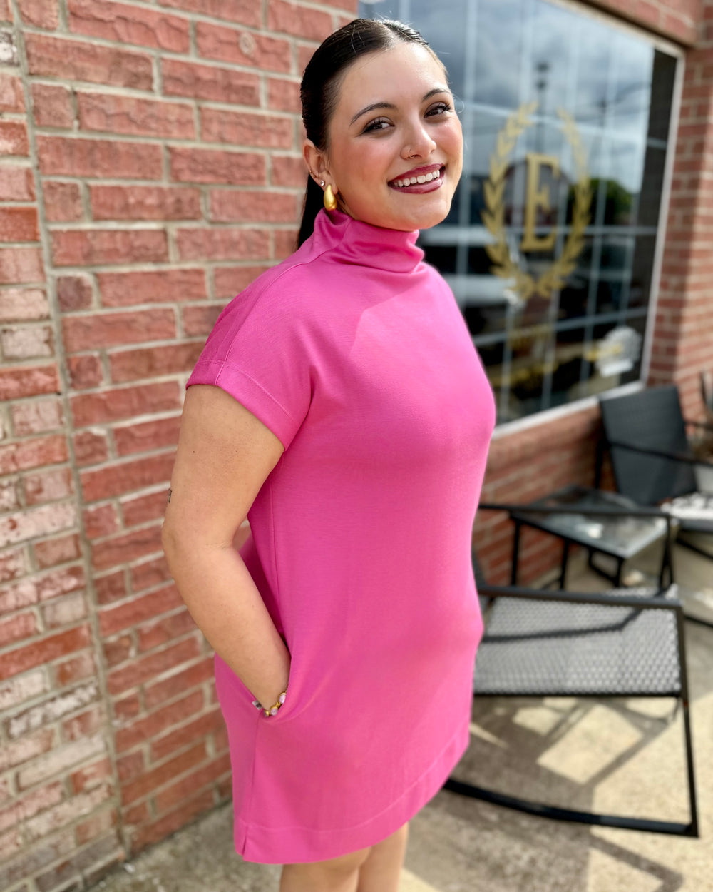 Pink Solid Mock Neck Pullover Dress available in sizes XS-XL. Simple, long-sleeved design with pockets.
