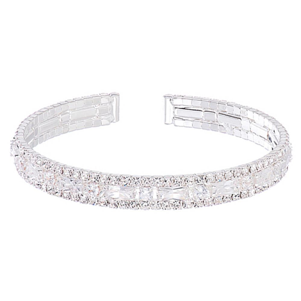 Silver-tone open-ended cuff with two rows of clear crystals. Available sizes: S, M, L.