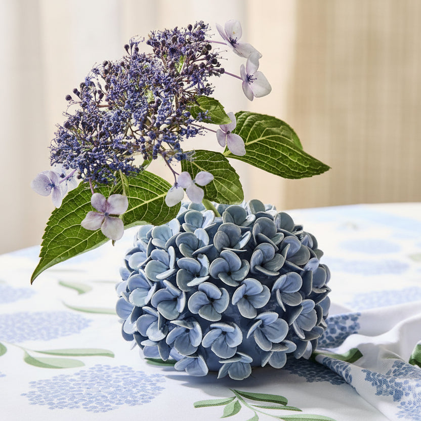 Porcelain Hydrangea Bud Vase/Taper Candle Holder with blue petals, sold individually.