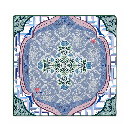 Chantilly Mat in Tube – square scarf with blue floral and paisley motifs, green and pink geometric borders, and symmetrical patterns in blue, white, and green. Available sizes: 55cm x 55cm, 90cm x 90cm.