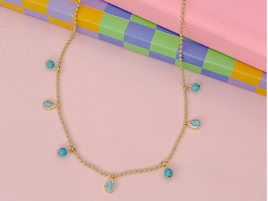 Turquoise Teardrop Necklace with gold beaded chain, turquoise beads, and teardrop charms. Available in 16", 18".