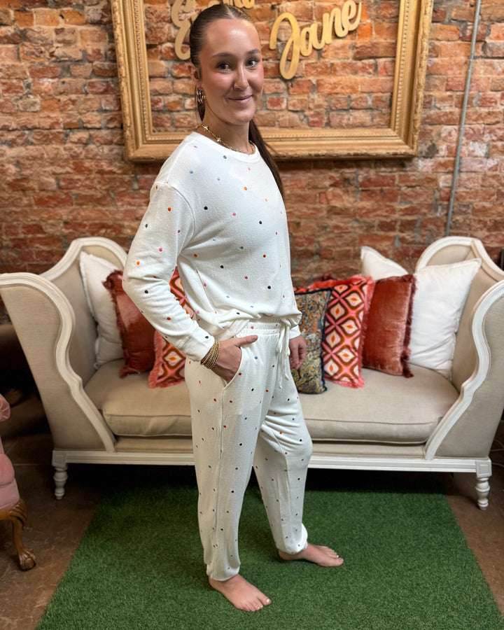 Sophie Confetti Dot Jogger Set: two-piece loungewear with multicolor confetti dots, available in sizes XS-XL.