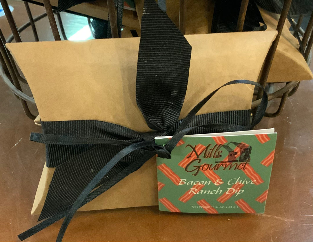 This product is a gift-wrapped package with a delectable "Bacon, Chive &amp; Ranch Dip" tag hanging from a black ribbon. The package comes nestled in a sturdy wire basket for thoughtfulness and convenience. Available in standard size only.