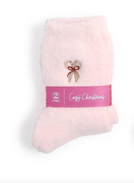 Pale pink Cozy Holiday Socks with candy cane appliqué and “Cozy Christmas” band. Available in all sizes.