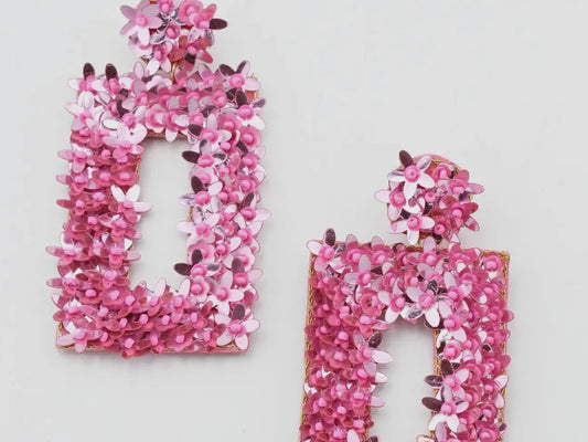 Textured, rectangular Penelope Floral Earrings with pink and magenta sequin flowers. Available in one size.