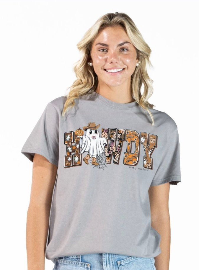 Howdy Ghost T-Shirt in driftwood grey cotton with a Western-themed graphic, “HOWDY” text, cartoon ghost in cowboy hat, and fall/Halloween icons. Available in sizes S-XXL.