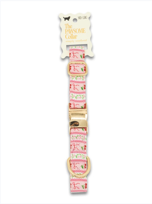 Cherry Pink Pet Collar with floral and ribbon pattern, gold hardware, bone-shaped tag. Available in MD-LRG sizes.