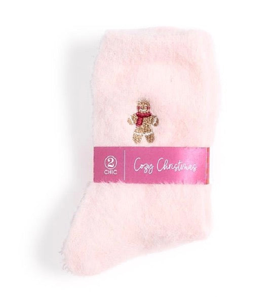 Cozy Holiday Socks: soft pink socks with an embroidered gingerbread man. Available in all sizes.