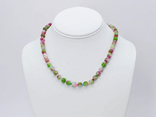 The Camo Girly Necklace by Treasure Jewels has round, faceted beads in green, pink, white, and beige. Sizes available.