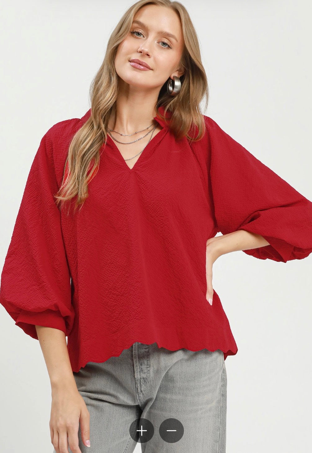 Red Textured Scalloped Top with long balloon sleeves and V-neck, loose fit; available in sizes XS-XL.