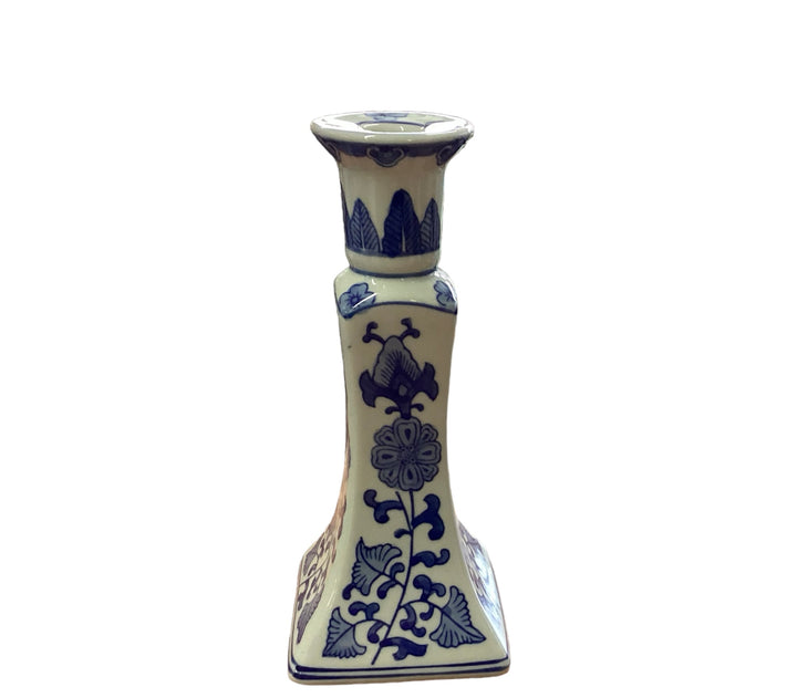 Square ceramic candleholder with blue floral patterns, flared top, decorative sides. Available in small and large sizes.