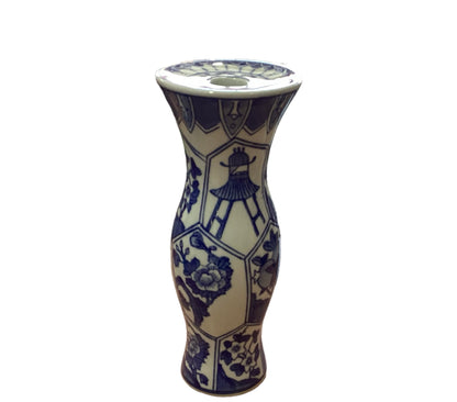 Tall blue and white porcelain candleholder with floral, geometric, and Asian pagoda motifs. Available in multiple sizes.