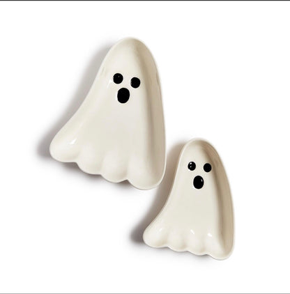 Set of two white ceramic bowls shaped like cartoon ghosts with black eyes and open mouths. Sizes available.