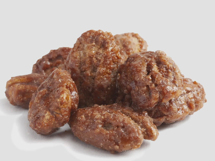 Cinnamon Pecans, 3oz size, with a glossy, textured surface coated in sweet cinnamon-sugar.