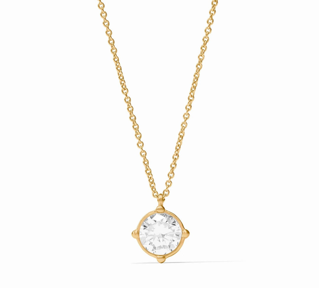 The Honeybee Solitaire Necklace Gold is a 24K gold-plated chain with a single round clear cubic zirconia in a minimalist gold setting. Available sizes: 16″, 18″.
