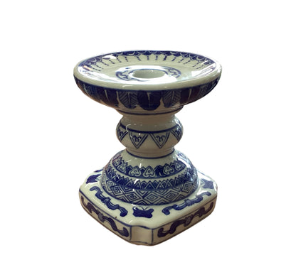 Decorative ceramic candleholder with blue patterns on cream, ornate base, wide shallow top. Available in 2", 4", and 6" sizes.