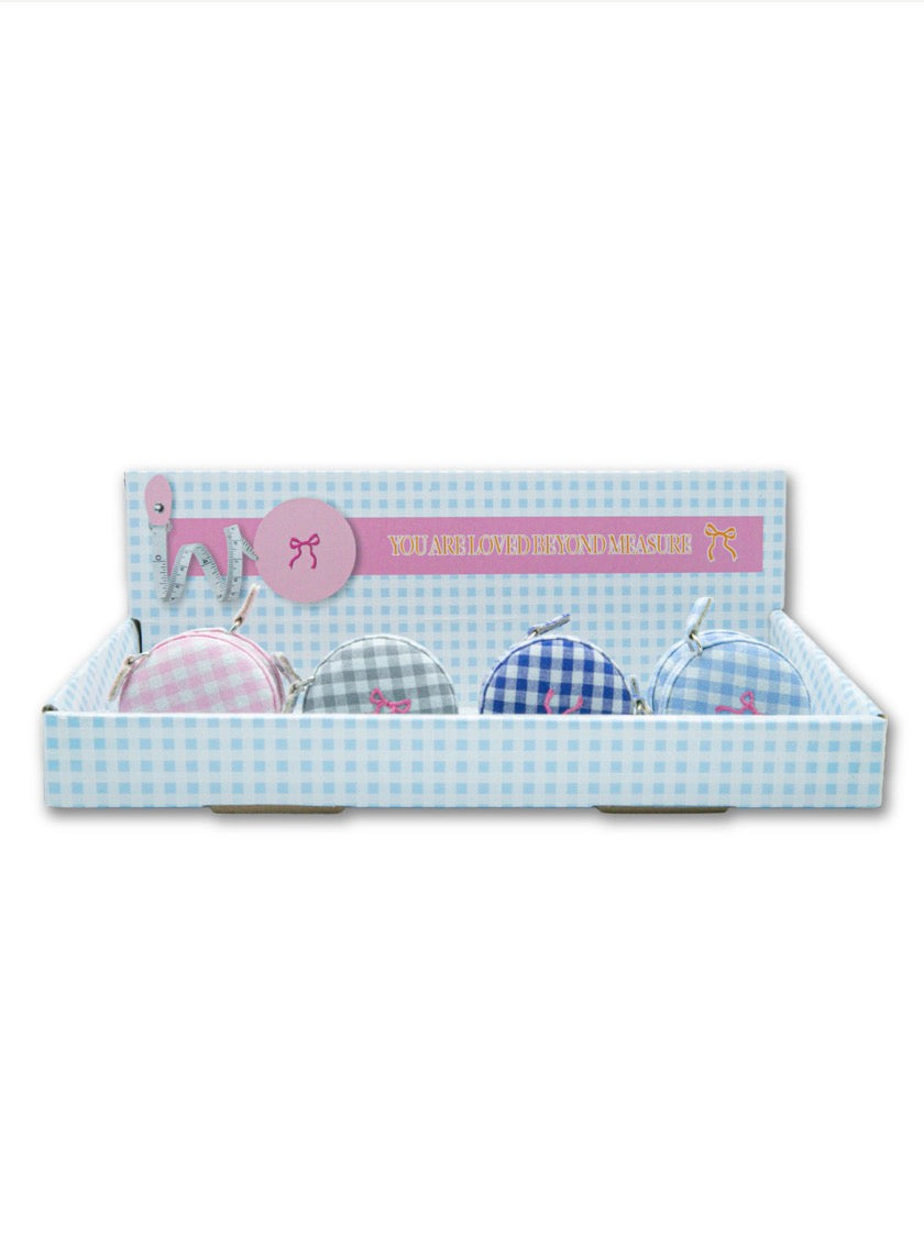 You Are Loved Tape Measure" set: round gingham coin purses (pink, gray, blue, purple) each with tape measure. Sizes: Standard.