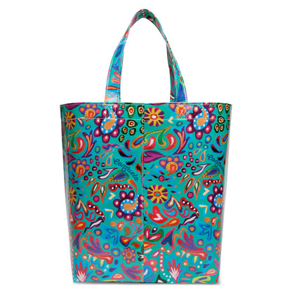 Colorful tote bag with bold floral and abstract patterns in red, blue, yellow, and green on a turquoise background; easy to clean. Available in multiple sizes.