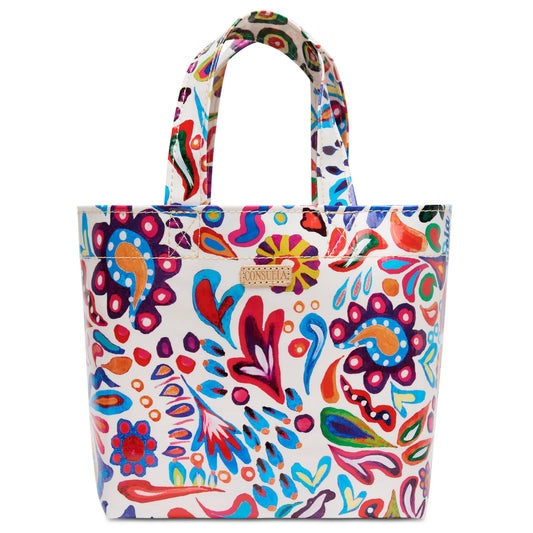 White ConsuelaCloth tote with red, blue, orange, and purple floral paisley print, two handles, gold label. Sizes: Mini.