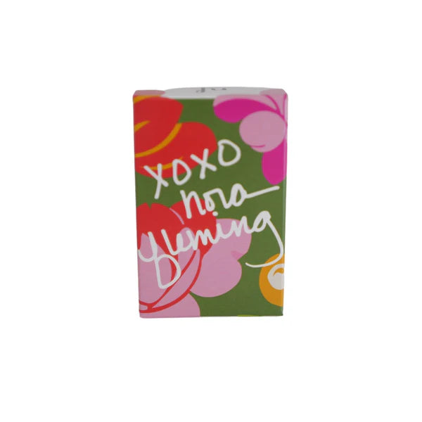 Small rectangular green gift box with pink, red, and green floral design, "xoxo nora fleming" on front. Size: small.
