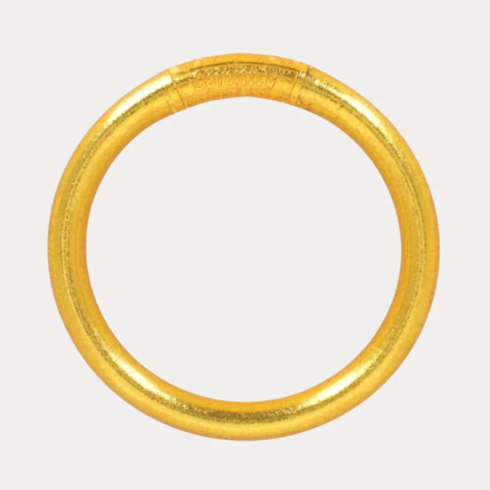 Shiny, smooth, handcrafted circular gold bangle. Available in multiple sizes.