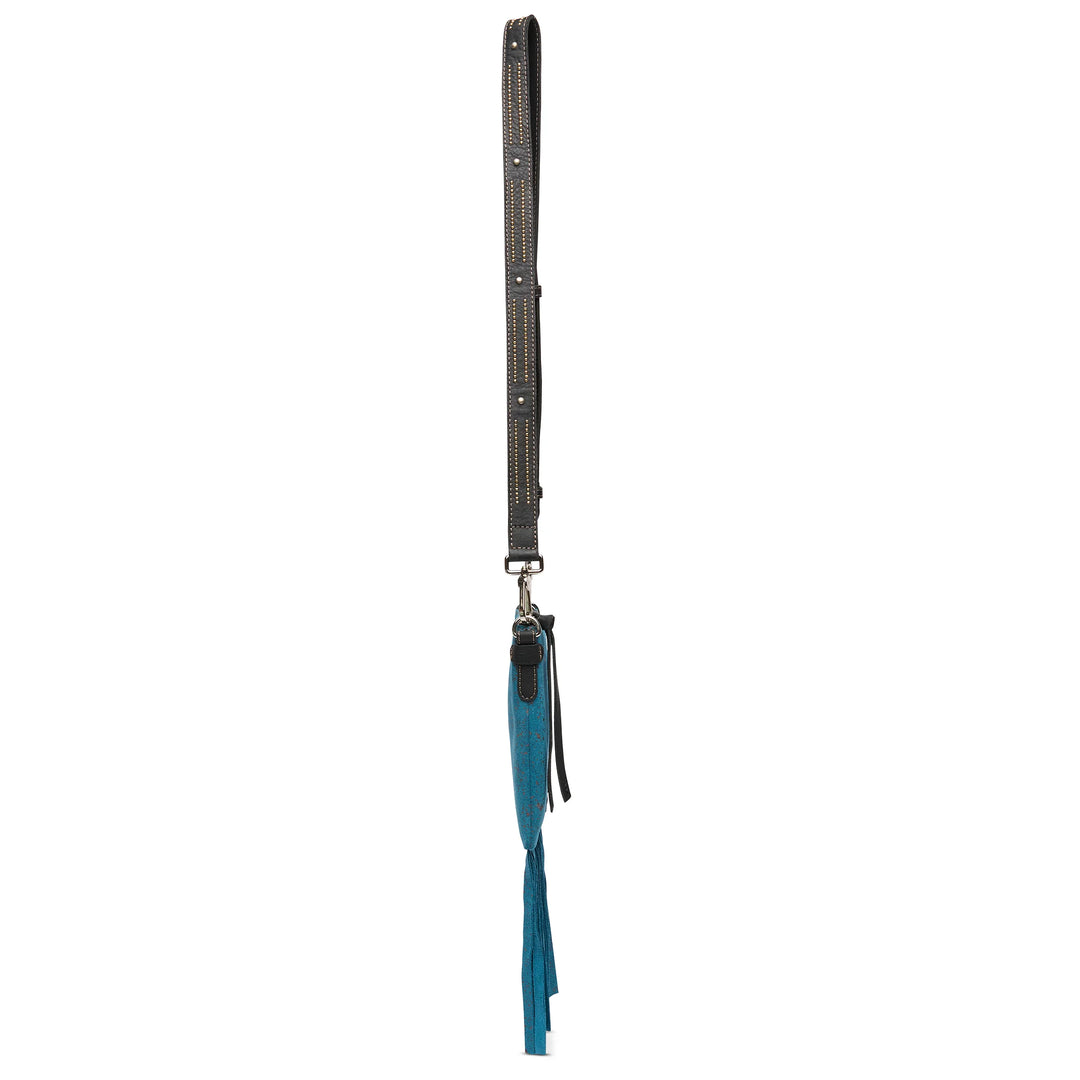 The Explorer Mini, Nilo: black leather strap, metal studs, silver buckle, teal tassel. Available in S/M/L.