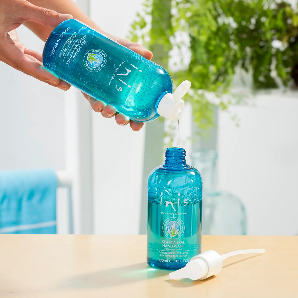 Inis Sea Mineral Hand Wash Refill 500ml being poured; available in 500ml size.