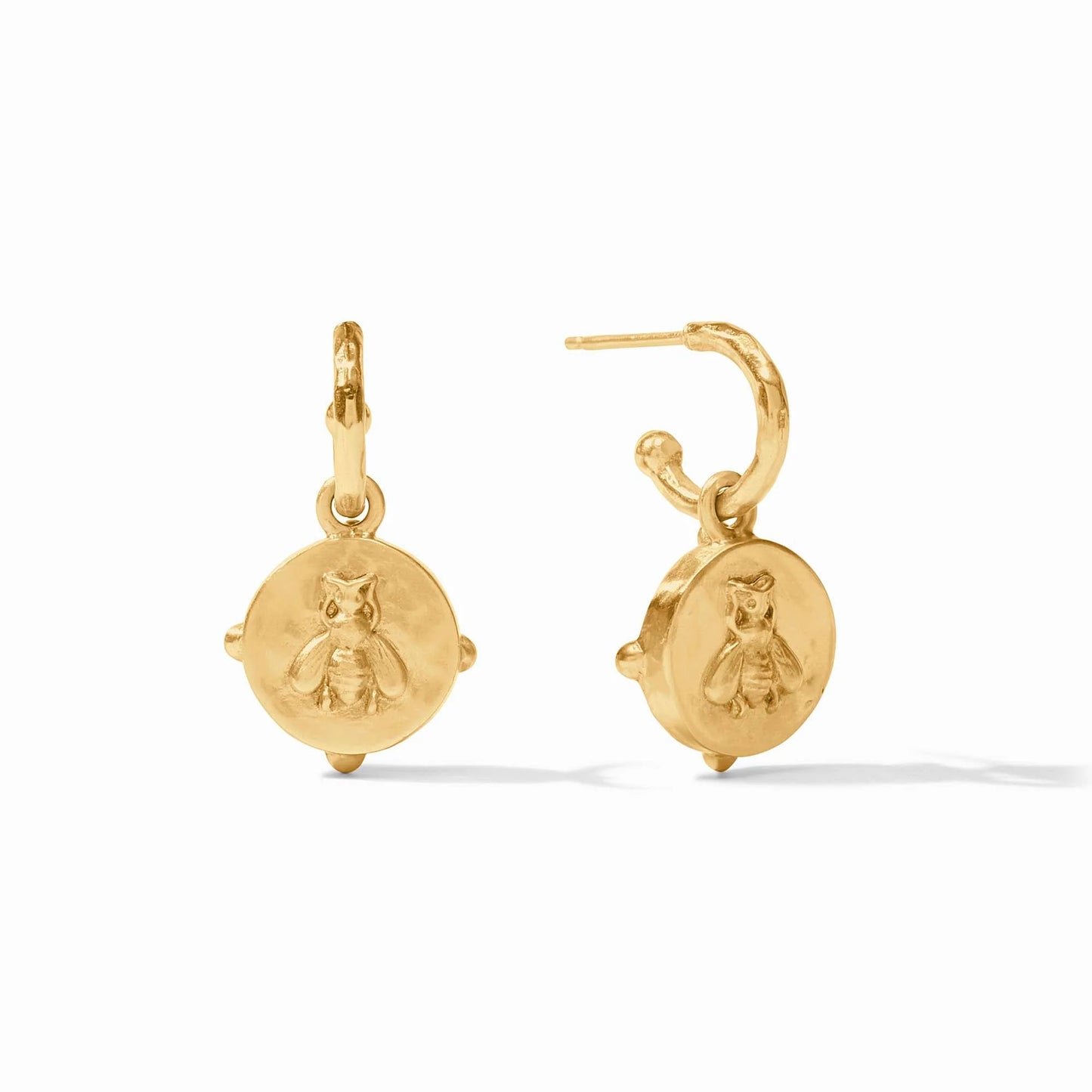 Gold hoops with round, reversible charms featuring a raised bee design at the center. Available in multiple sizes.